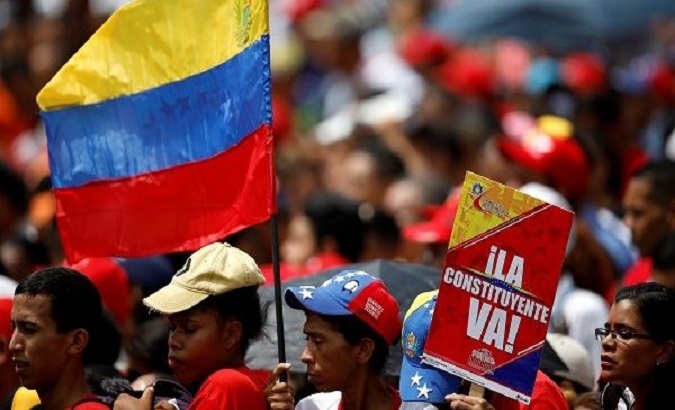 Government supporters attend the closing campaign ceremony for the Constituent Assembly election in Caracas, Venezuela, July 27, 2017.