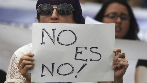 Women take part in a protest against discrimination and violence against women on International Women's Day in Bogota, Colombia, March 8, 2016.