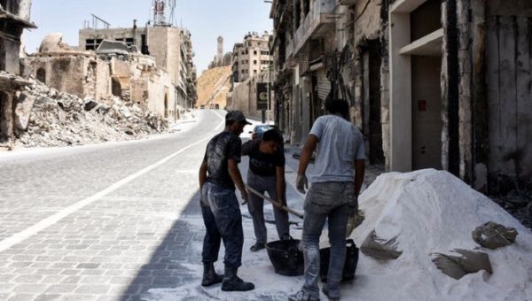 Rebuilding a damaged store in Aleppo's old city, which was recaptured by Syrian Government forces in December of 2016.