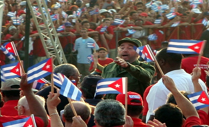 Castro amid cheering crowds in 2005.