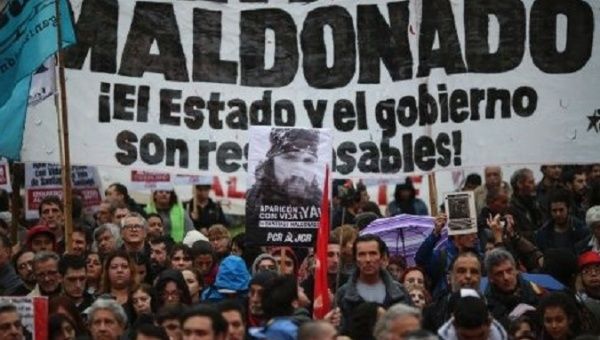 Protesters demand the return of disappeared Mapuche supporter Santiago Maldonado.
