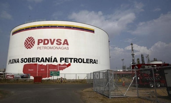 An oil tank is seen at PDVSA's Jose Antonio Anzoategui industrial complex, which reads, 