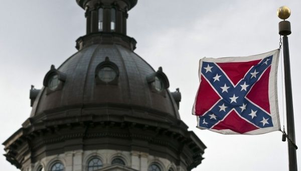 A Confederate flag flies on South Carolina Statehouse grounds in Columbia, South Carolina.