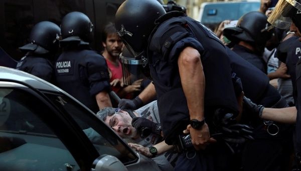 Police intervene as far right demonstrators and counter protesters scuffle on Las Ramblas in Barcelona, Spain, on August 18, 2017. 