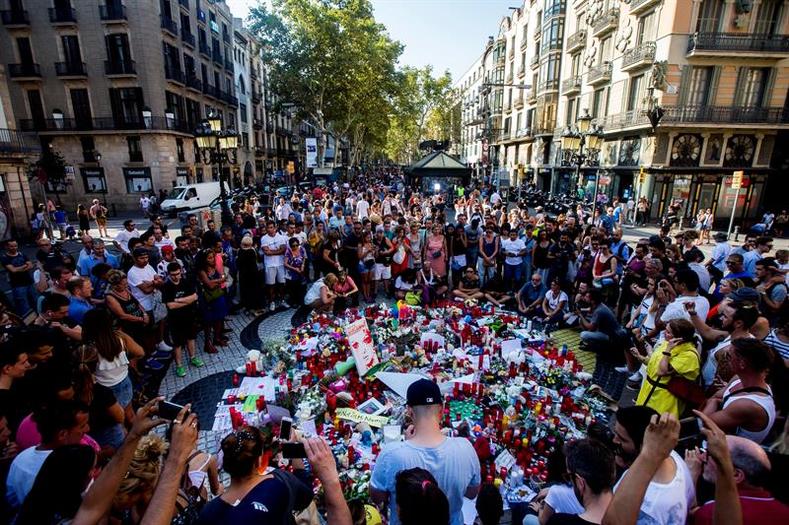 Hundreds turned out for Friday's vigil in Las Ramblas, Barcelona.