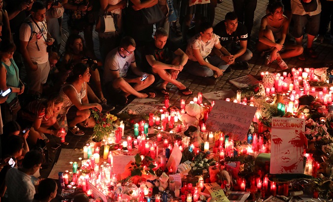 An impromptu memorial is held a day after a van crashed into pedestrians at Las Ramblas in Barcelona, Spain, August 18, 2017