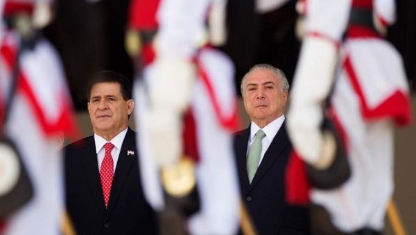 Temer receives Paraguayan president on the day his governement reveals plans to privatize the state-controlled electricity company