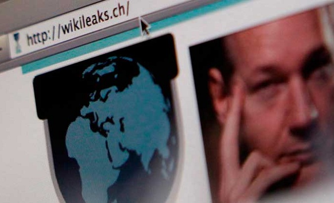 A screen shot of a web browser displaying the WikiLeaks website with a picture of its founder Julian Assange.
