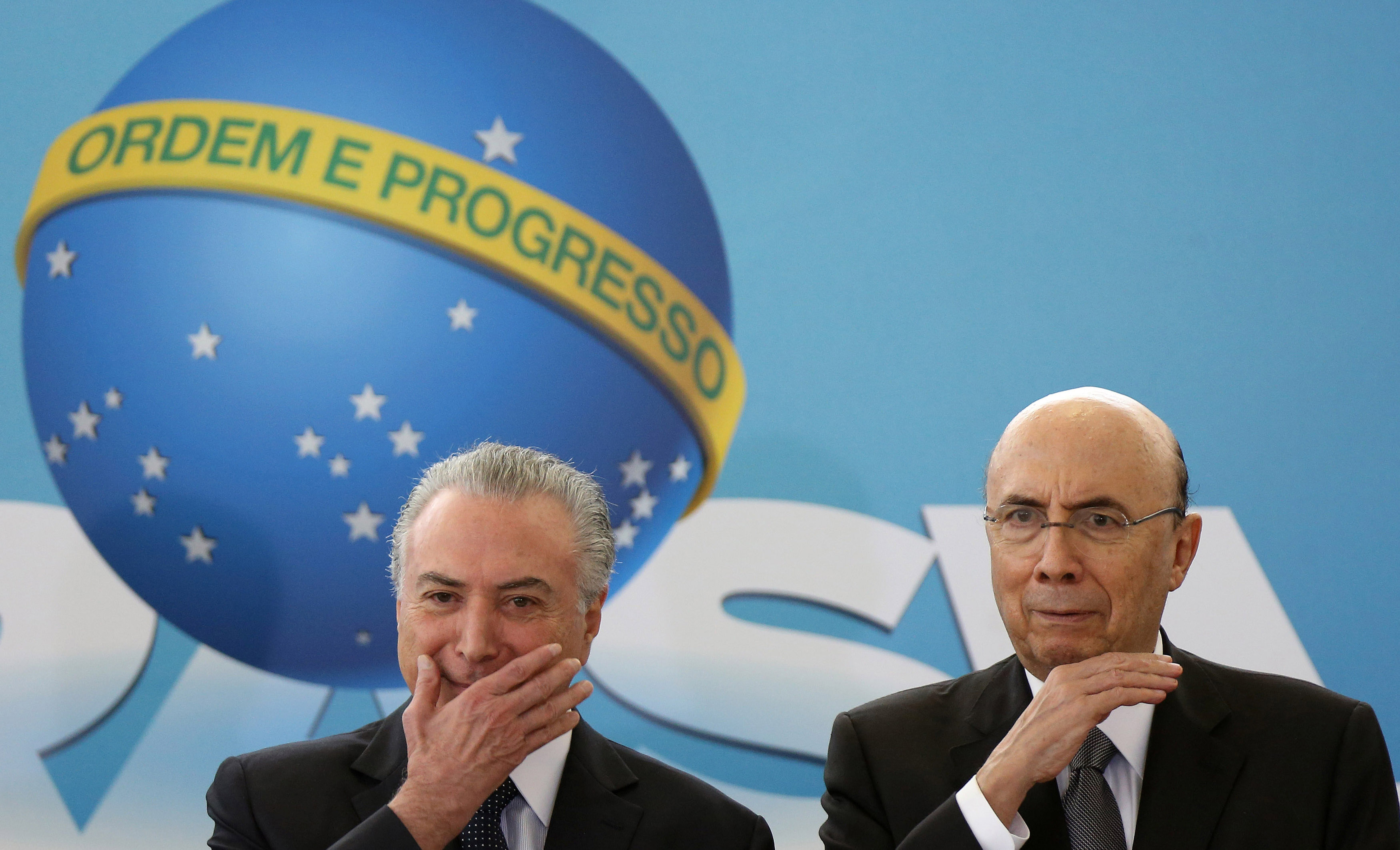 Brazil's President Michel Temer and Brazil's Finance Minister Henrique Meirelles launch the new program of the Brazilian state development lender BNDES at the Planalto Palace in Brasilia, Brazil, August 23, 2017.