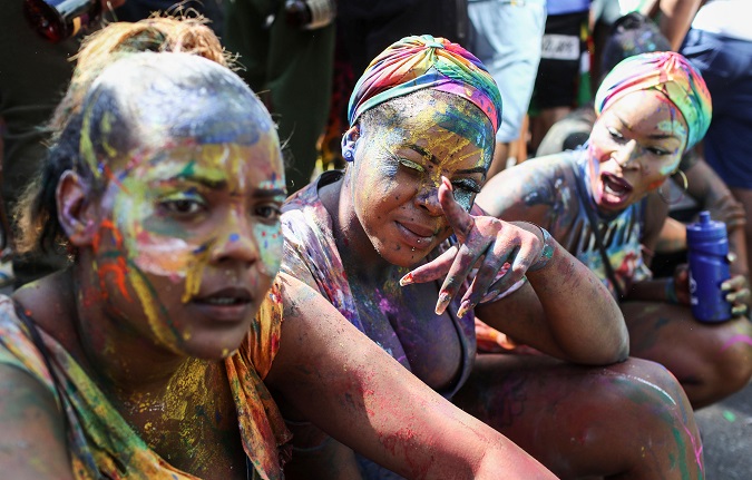 Women taking a rest during London's annual Notting Hill Carnival.
