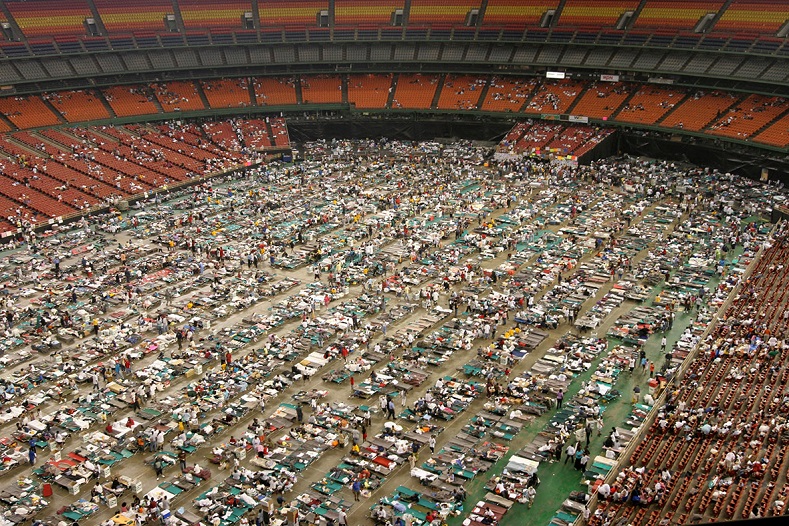 Thousands of refugees fill the floor of the Astrodome in Houston, Texas.