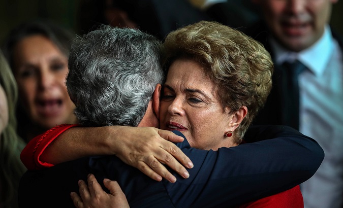 Dilma Rousseff embraces Senator Jorge Viana following her impeachment at at the Palace of Alborada in Brasilia, Brazil,August 31, 2016