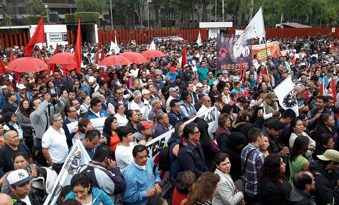 Demonstrators protest the government of President Enrique Peña Nieto.