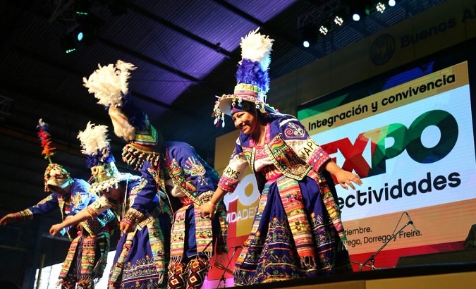A folkloric group dances at Argentina’s exposition.