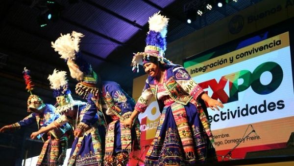 A folkloric group dances at Argentina’s exposition.  