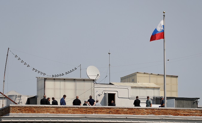 People are seen on the rooftop at the Consulate General of Russia in San Francisco, California, U.S., September 2, 2017.