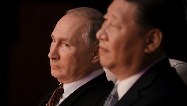 Russian President Vladimir Putin and Chinese President Xi Jinping watch a concert in Xiamen, China September 3, 2017.