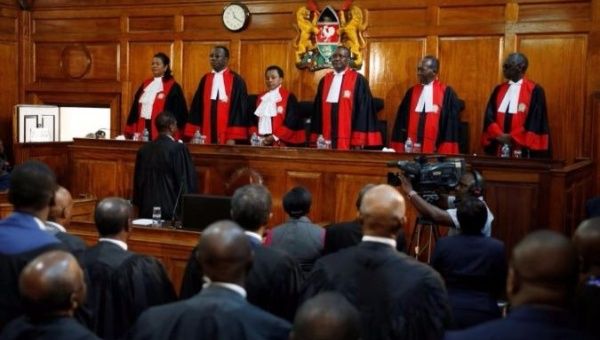 Kenya's Supreme Court judges enter the courtroom before delivering the ruling making last month's presidential election invalid.