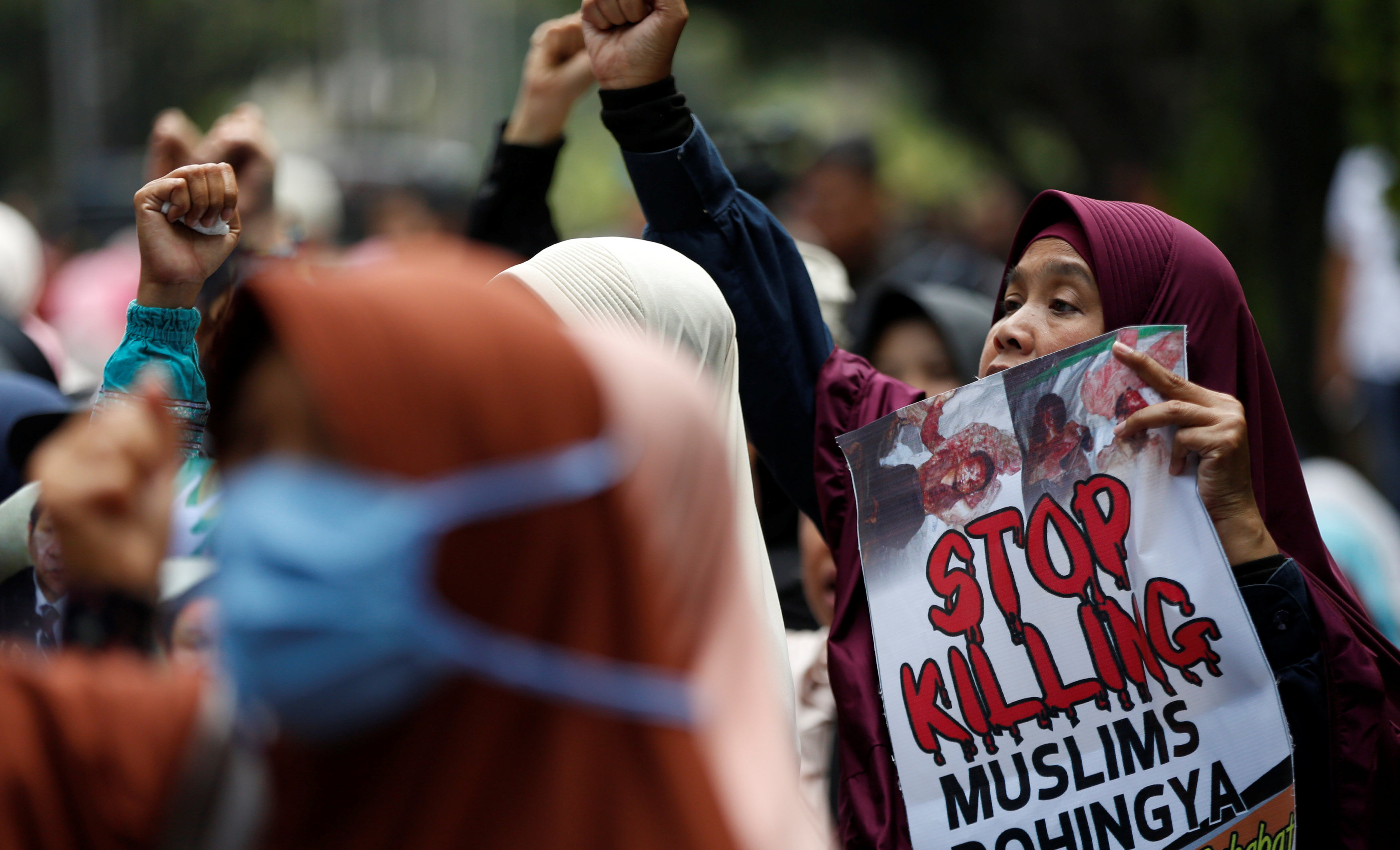 Muslim women activists take part in a rally in support of Myanmar's Rohingya minority during one of the deadliest bouts of violence involving the Muslim minority in decades outside the Myanmar embassy in Jakarta, Indonesia September 4, 2017.
