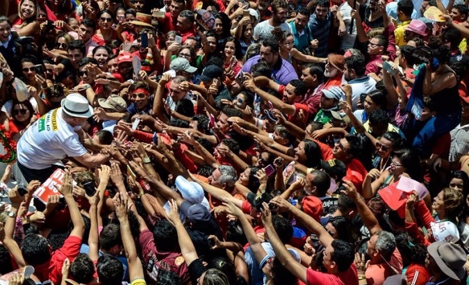 Lula greets people from Banabuiu, a countryside town in the state of Ceara, Brazil.