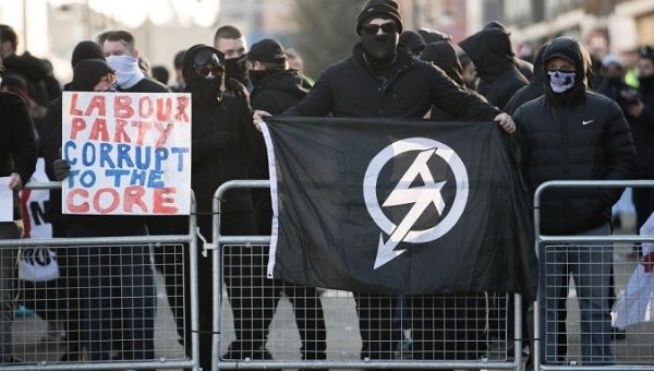 A flag of far-right group National Action was spotted among the protesters.