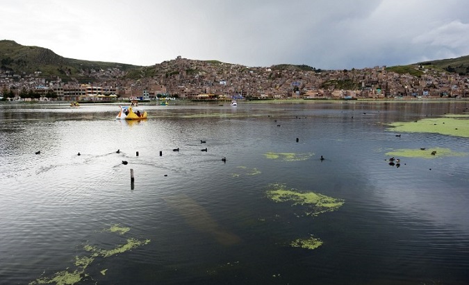 Population centers like the Peruvian city of Puno (above) threaten the lake with contamination, leading the Bolivian and Peruvian governments to each announce funds for its cleanup.