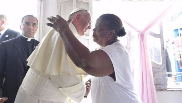 Pope Francis is welcomed in Cartagena, Colombia's historic Caribbean coastal town.
