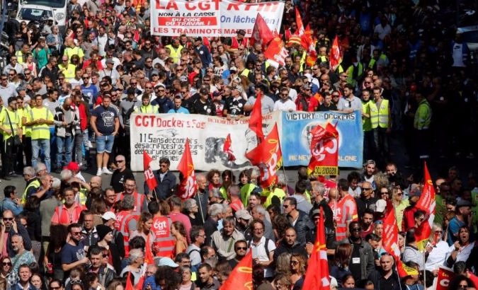 Demonstrators, holding CGT labour union flags, attend a national strike and protest against the government's labor reforms in Marseille, France.