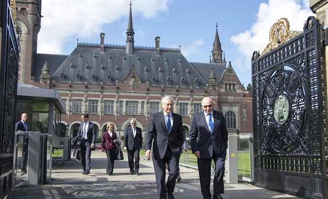 The Chilean Foreign Minister Heraldo Munoz (L) and Claudio Grossman (R) at the International Court of Justice in The Hague, The Netherlands, September 15, 2017