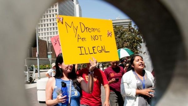 Protesters gather to show support for the Deferred Action for Childhood Arrivals (DACA) program recipient during a rally outside the Federal Building in Los Angeles, California, U.S., September 1, 2017