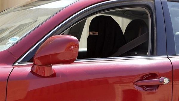  A woman drives a car in Saudi Arabia in 2013 file photo.