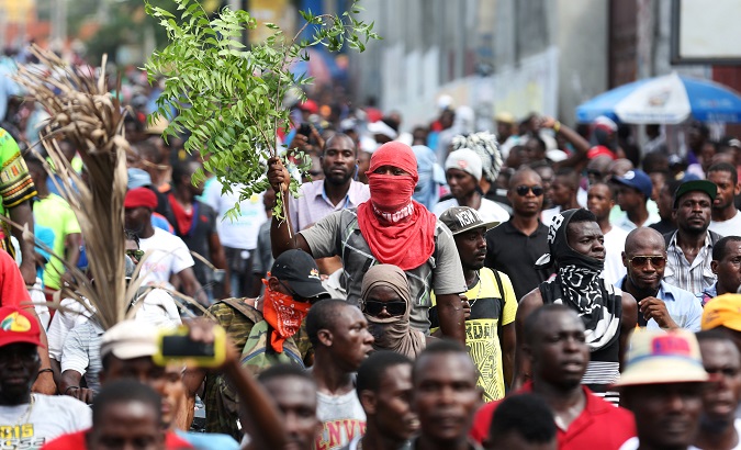 People take to the street to protest against tax hikes, in Port-au-Prince, Haiti September 20, 2017.