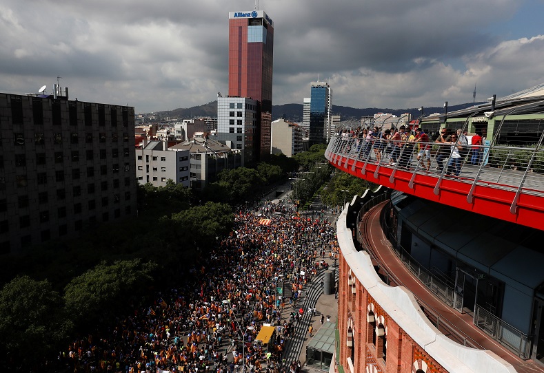 Thousands of students, workers and attorneys protest in the streets of Barcelona.