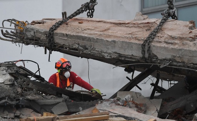 Rescuers keep working on recovery of victims from the deadliest building collapse in Mexico's September 19 earthquake, at a building on Alvaro Obregon street