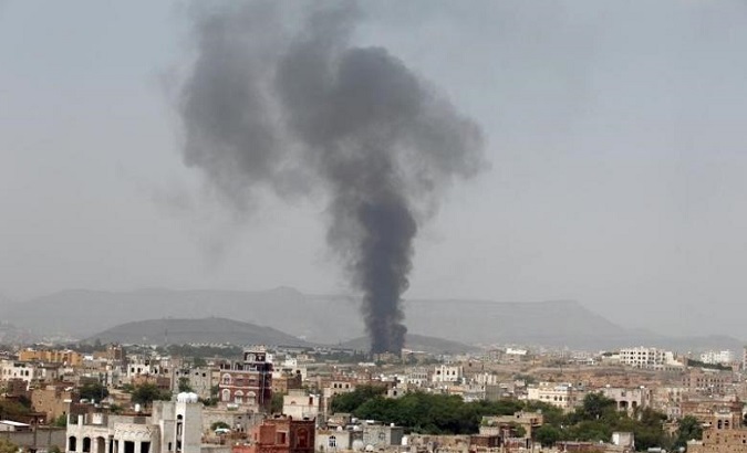 Smoke rises from a snack food factory after a Saudi-led air strike hit it in Sanaa, Yemen.