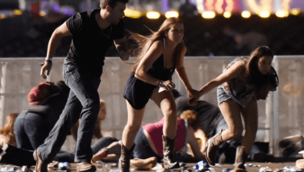 People run from the Route 91 Harvest country music festival after gun fire (