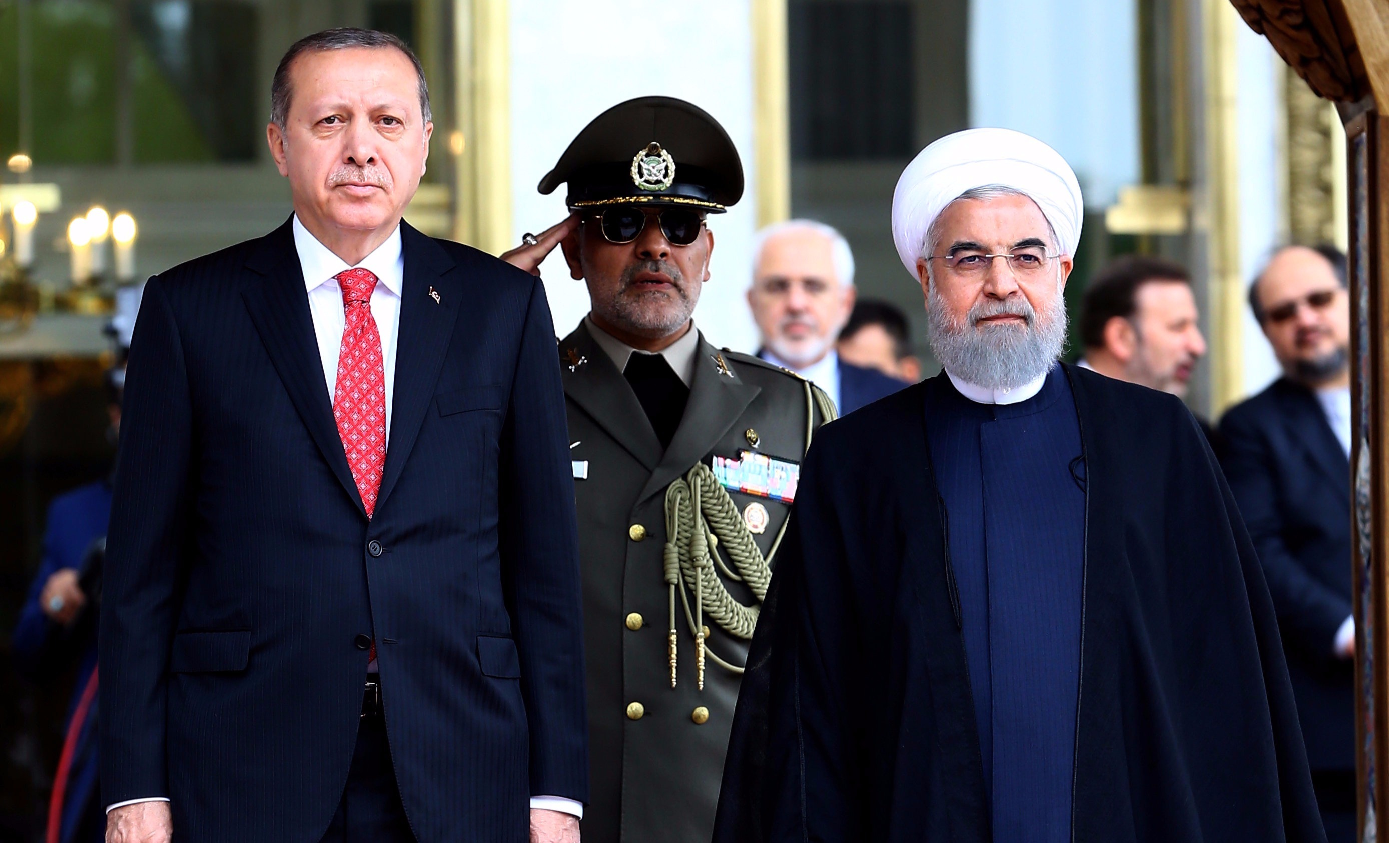 Turkish President Tayyip Erdogan is seen with Iranian President Hassan Rouhani during a welcoming ceremony in Tehran, Iran, Oct. 4, 2017.
