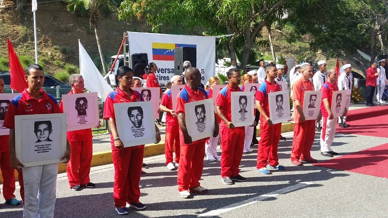People in Venezuela also held the photos of the 73 people who died in the Cubana Flight 455.