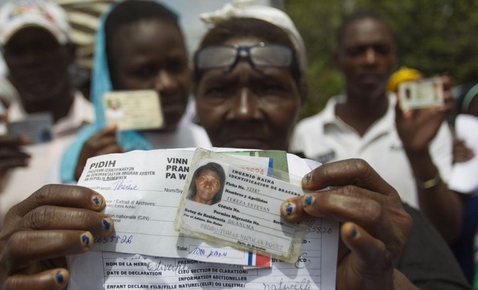 Haitians are deported despite legal documentation under claims that they may have been forged.
