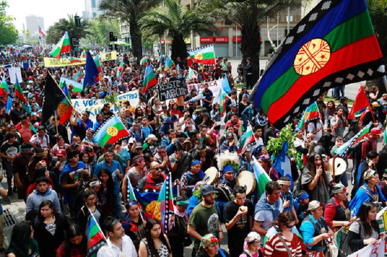 Mapuche Indian and other activists take part in a rally against Columbus Day in downtown Santiago.