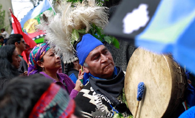 Mapuche Indian activists take part in a rally against Columbus Day in downtown Santiago, Chile.