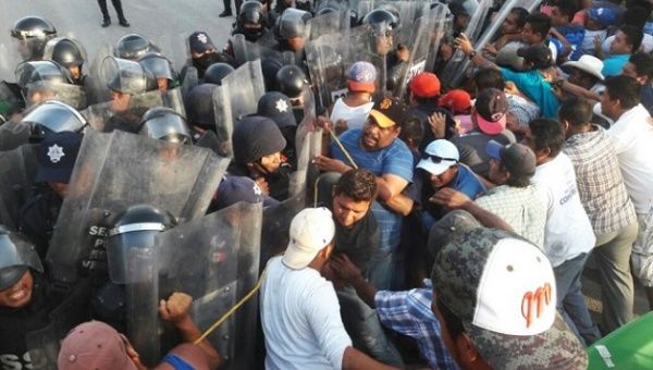The police attack protesters in Veracruz, Mexico.