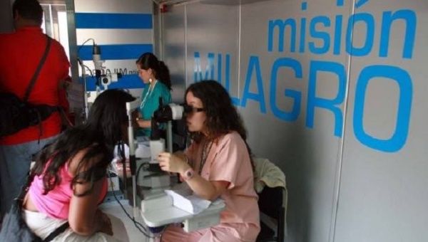 Cuban doctors treating patients under the program.
