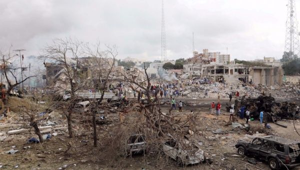 Somali government forces and civilians gather at the scene of an explosion in KM4 street in the Hodan district of Mogadishu, Somalia October 15, 2017. 