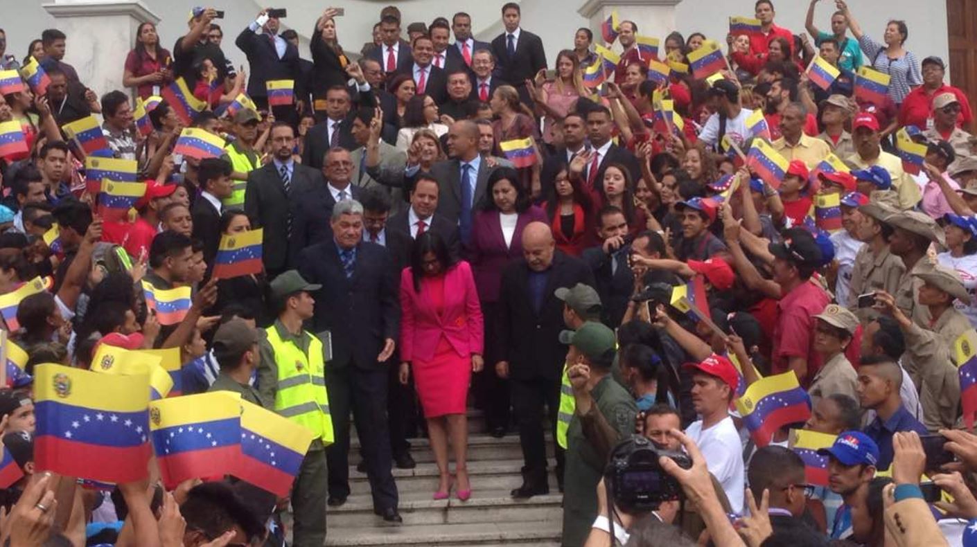 Venezuela's ANC President Delcy Rodriguez is flanked by newly elected governors who are being sworn in by the ANC.