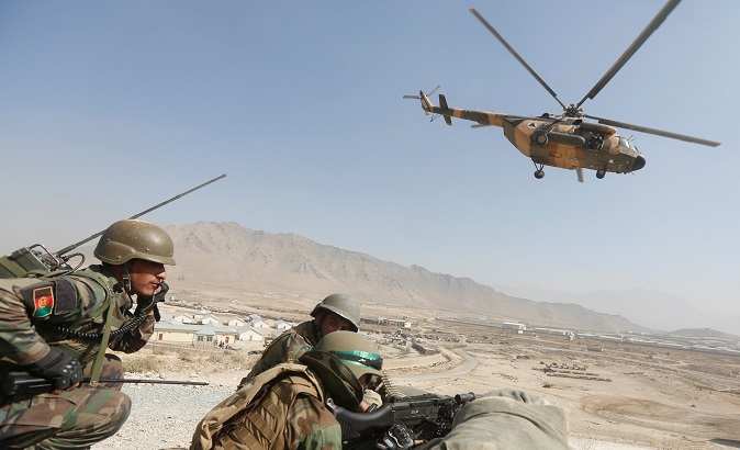 Afghan National Army (ANA) officers take part in a training exercise at the Kabul Military Training Centre.