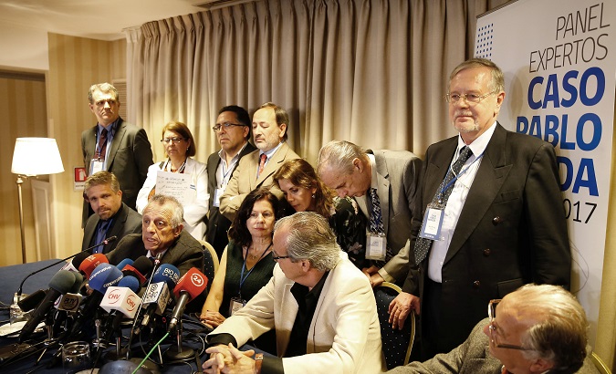 The Spanish forensic doctor Aurelio Luna, with a group of forensic experts, speaks during a news conference on Neruda's death, Santiago, Chile October 20, 2017