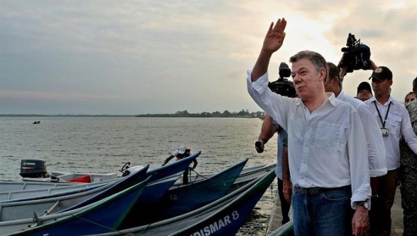 The Colombian President Juan Manuel Santos greets a fishing community during his visit to Tumaco, Narino, Colombia, October 21, 2017.