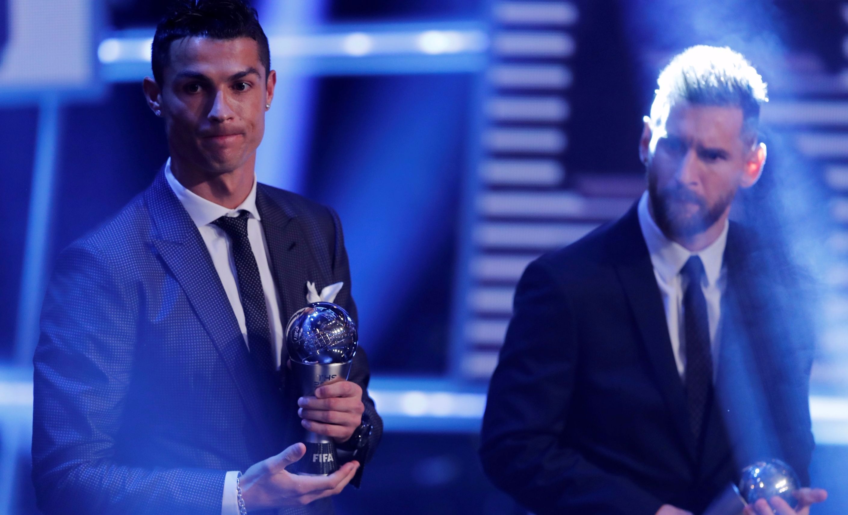 Real Madrid’s Cristiano Ronaldo and Barcelona’s Lionel Messi after being selected in the FIFA FIFPro World 11 during the awards.