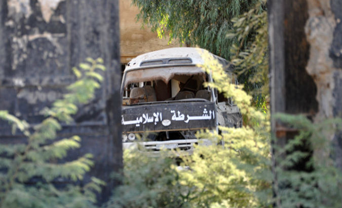 An abandoned Islamic State group vehicle in al-Mayadin.